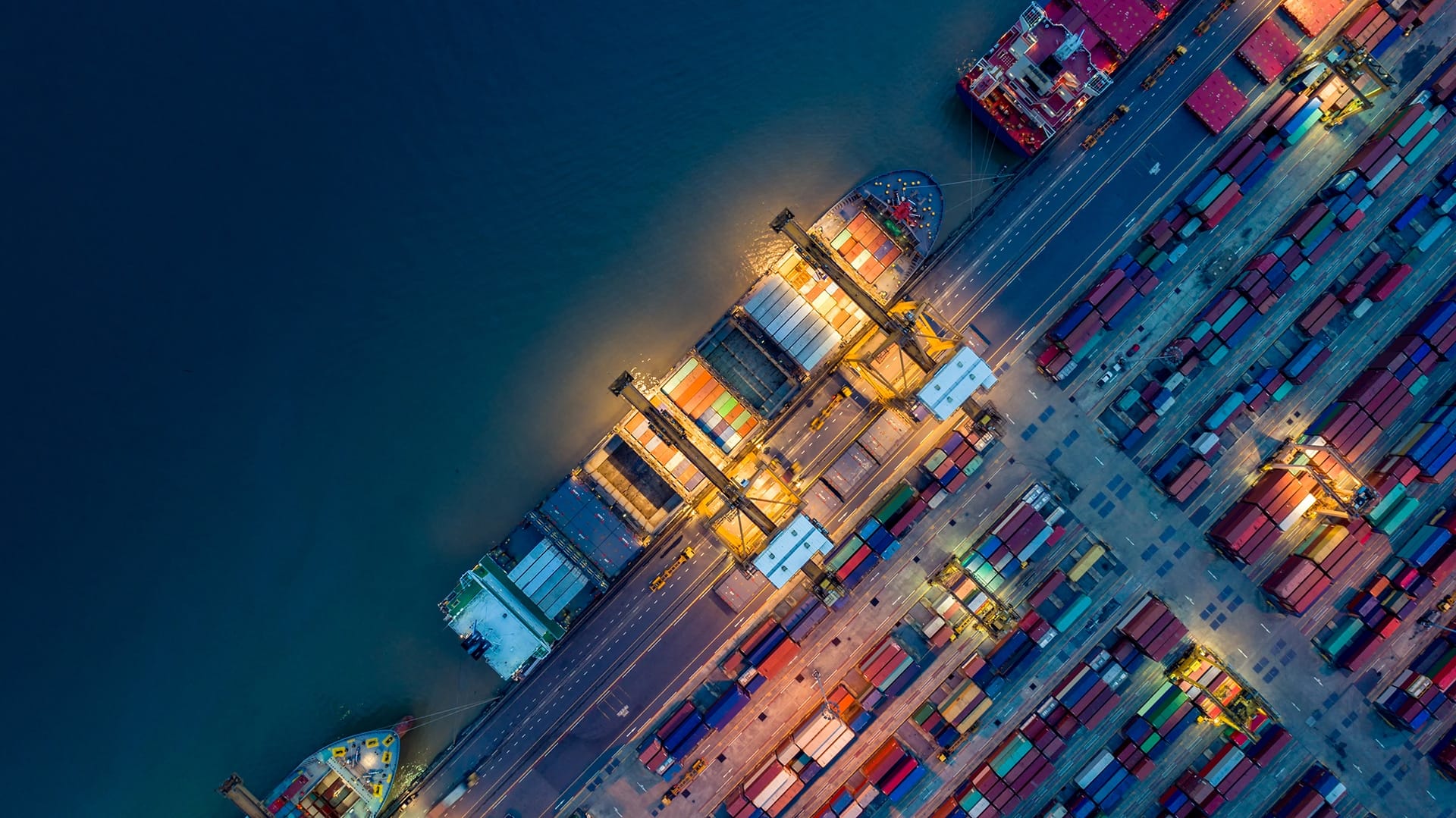 Container ship being loaded at docking station